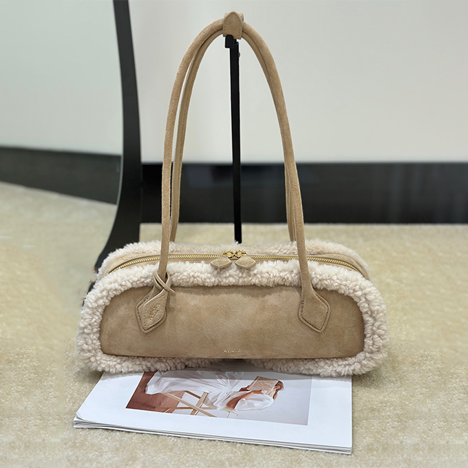 alaïa le teckel shearling long barrel shoulder handbag